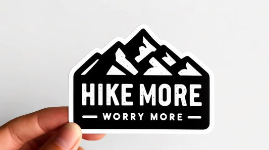 Vinyl sticker: Rugged Mountain Silhouette Sticker 'Hike More, Worry Less' - Hunter Style, Waterproof Decal for Outdoor Enthusiasts"
