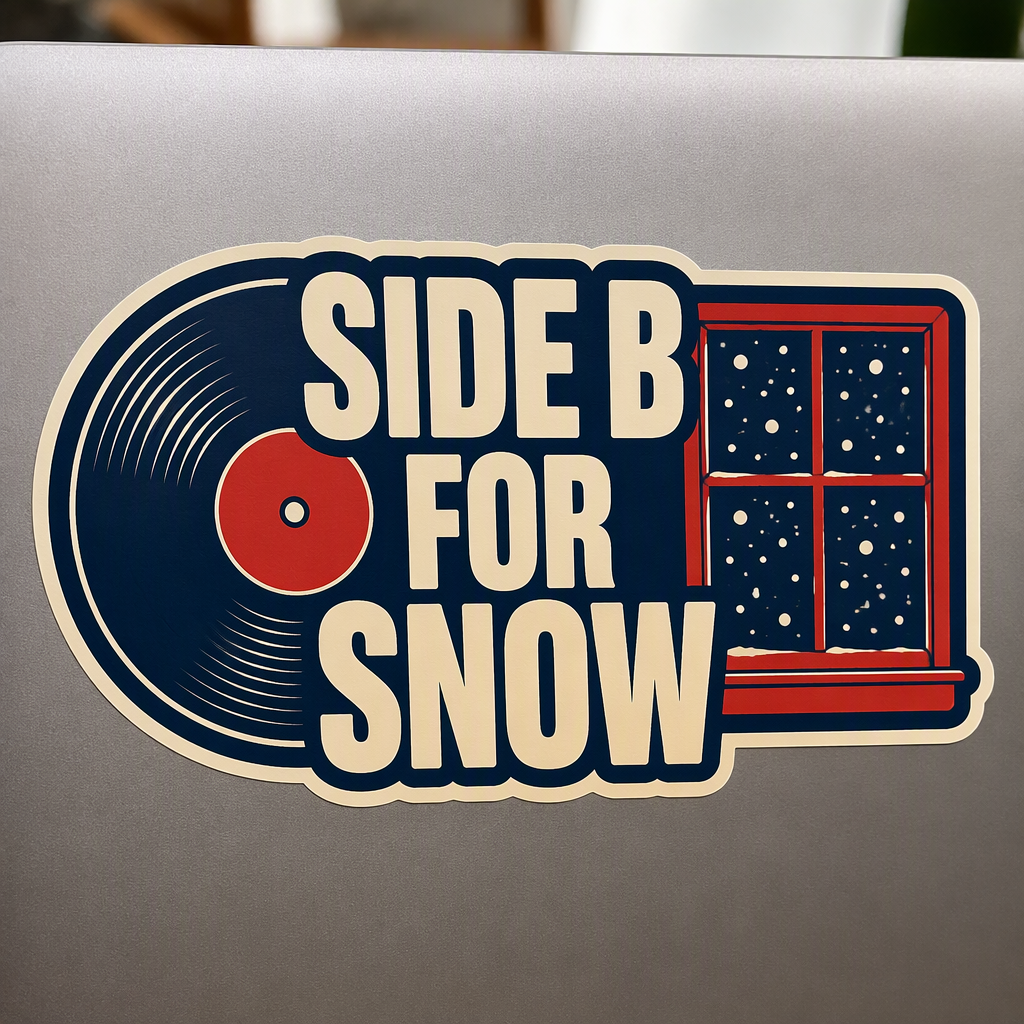 “SIDE B FOR SNOW” pairs a record with a window full of broad falling flakes for a playful blend of music-loving spirit and winter weather charm.