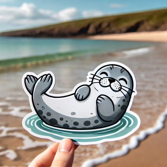 Vinyl sticker: Waterproof Harbor Seal Sticker Decal for Laptop, Wall, Car, Window, Bumper, Truck, Water Bottle, Auto – Playful Seal Relaxing on Beach in Shallow Water