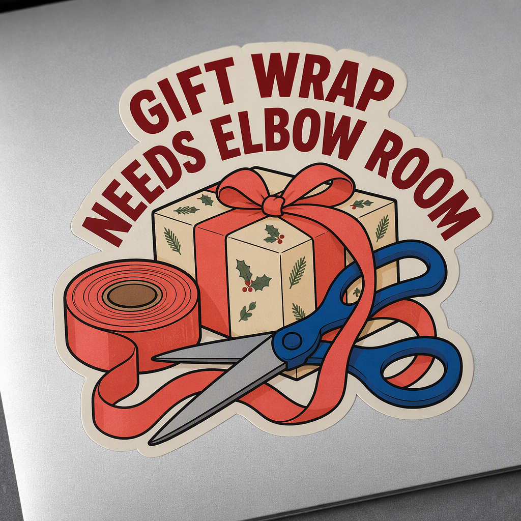 “GIFT WRAP NEEDS ELBOW ROOM” sweeps across this humorous holiday craft design in cranberry capitals, above a ribbon roll, wrapped parcel, and broad blunt craft scissors tangled in the scene.