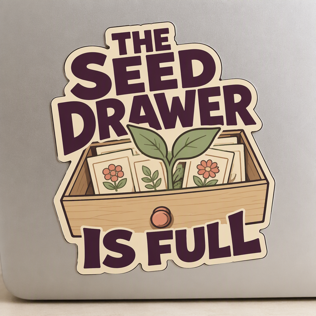 “THE SEED DRAWER IS FULL” appears in optimistic plum block letters around an open shallow drawer filled with blank seed packets and a broad sprout.